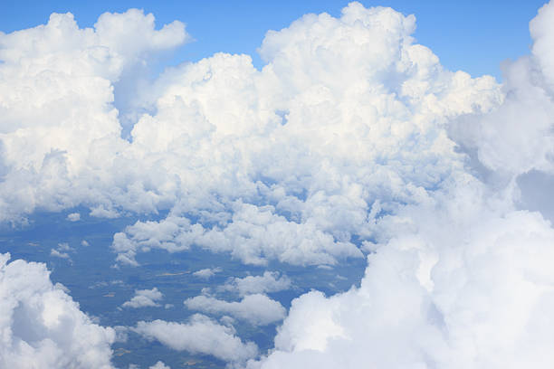 istock aerial top view from air plane cumulus cloud and cloudscape 525887758