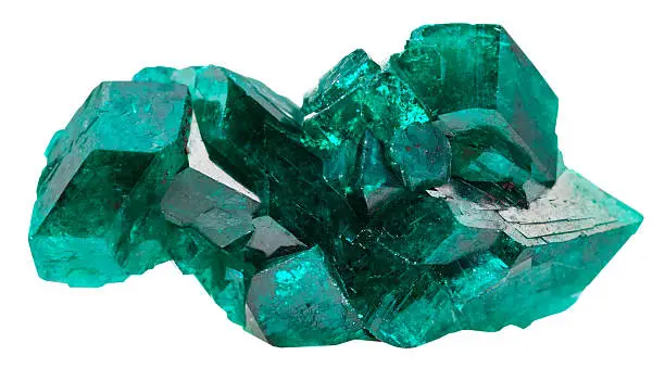 macro shooting of natural mineral stone - druse of emerald-green crystals of dioptase isolated on white background