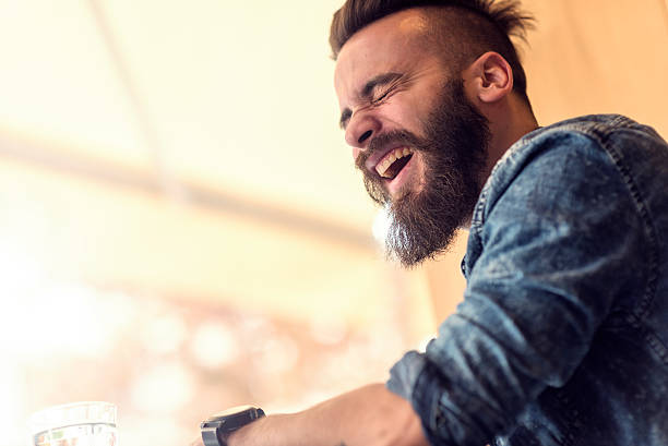 istock Close up of young man drinking coffee 525889690