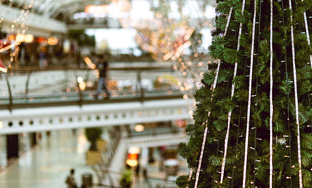 istock christmas tree in shopping center 525893565