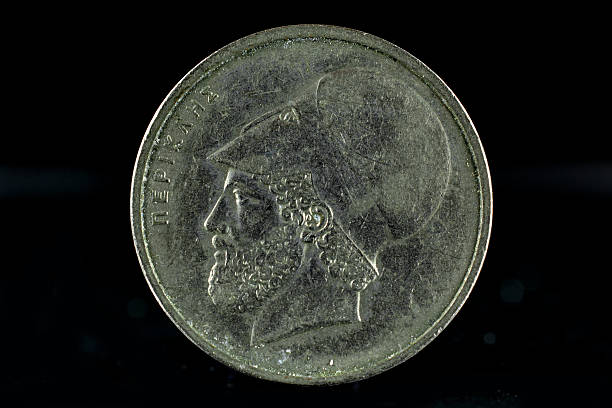 istock Used Greek Coin Isolated 525893659