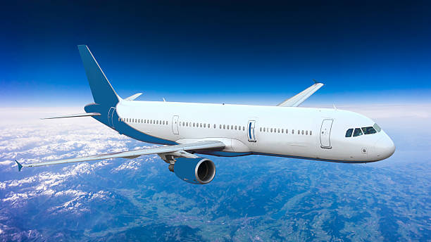 istock aeroplane.  Airplane over the mountains 525896543