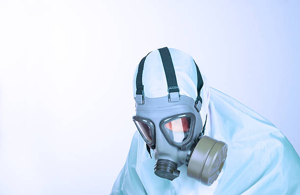 indumento protettivo - radiation protection suit toxic waste protective suit cleaning foto e immagini stock