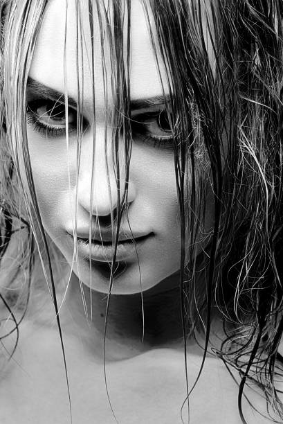 istock Close up portrait with wet hair bw 525897699