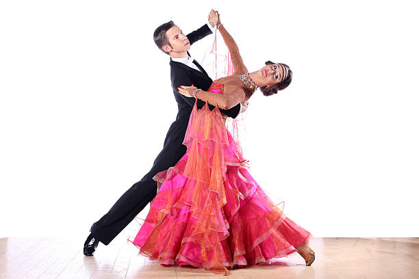 istock Latino dancers in ballroom isolated on white background 525898771