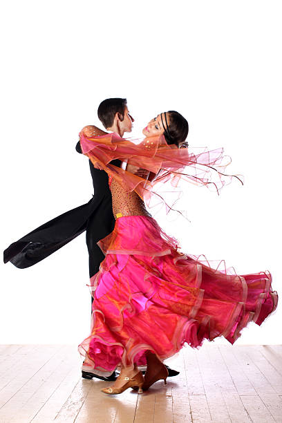 istock Latino dancers in ballroom against white background 525898785