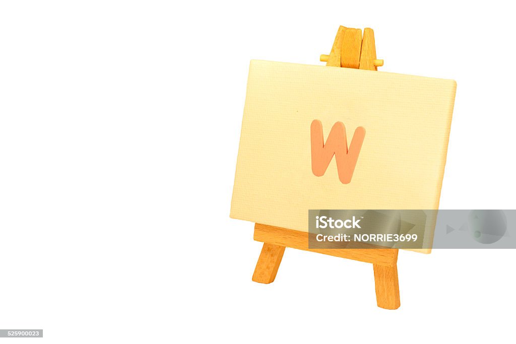 Painted 'W' An artists easel with the letter 'W' painted on the canvas.  The easel on a white background. Alphabet Stock Photo