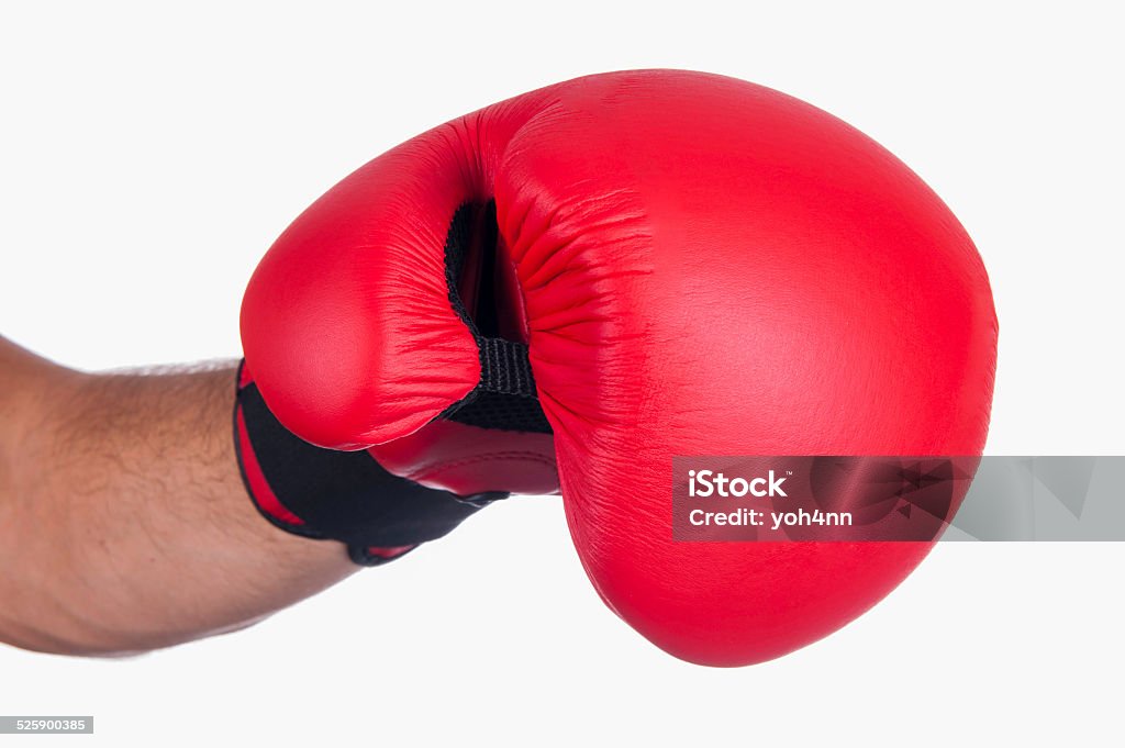 Boxing fight Hand in boxing glove punch in your direction. Isolated on white background Blank Stock Photo