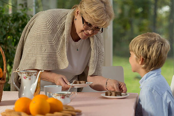 Grandma dishing up homemade cake