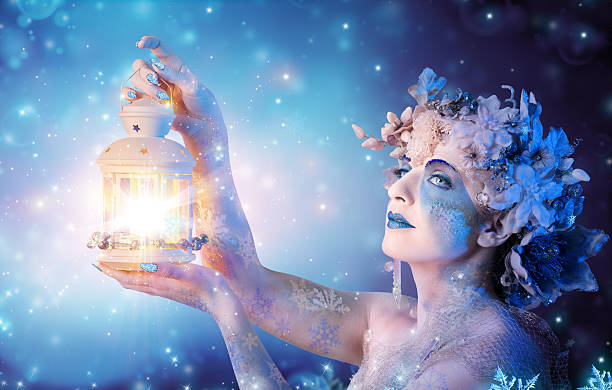 istock Winter woman portrait with lantern 525914185