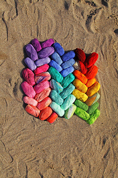 istock colorfull yarn balls on sand for knitting 525914723