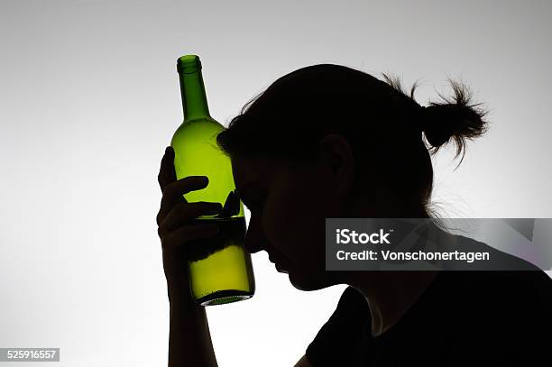 Silhouette Of A Woman Holding A Bottle Stock Photo - Download Image Now - Women, Alcohol Abuse, Drunk