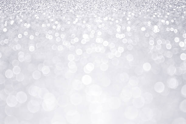 Silver Glitter Winter Christmas Background Abstract silver glitter sparkle winter Christmas background greeting card white decoration glitter stock pictures, royalty-free photos & images