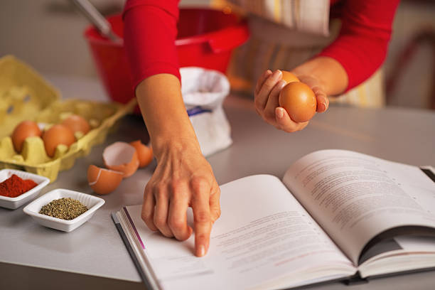 istock Closeup on happy young housewife preparing christmas dinner 525938377