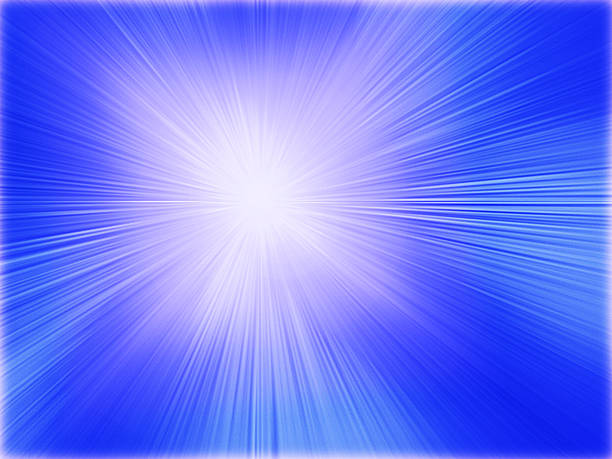 istock Sun on blue sky with lenses flare 525940175