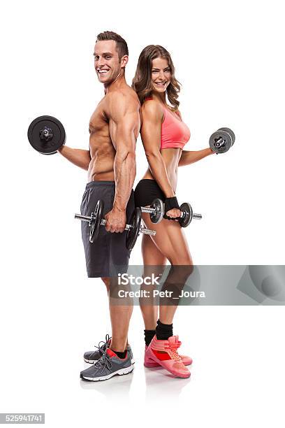 Beautiful Fitness Young Sporty Couple With Dumbbell Stock Photo - Download Image Now