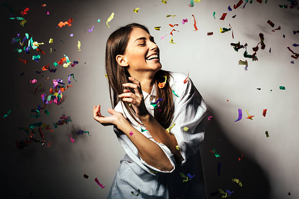 istock Happy beautiful female celebrating 525941957