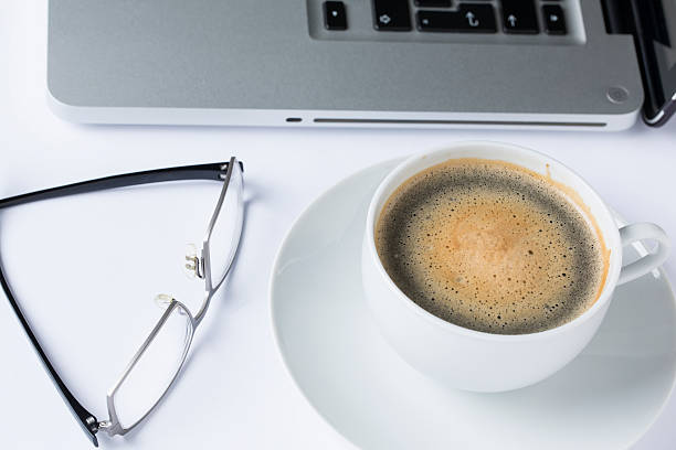 istock cup of coffee in a white cup on a white plate 525949593