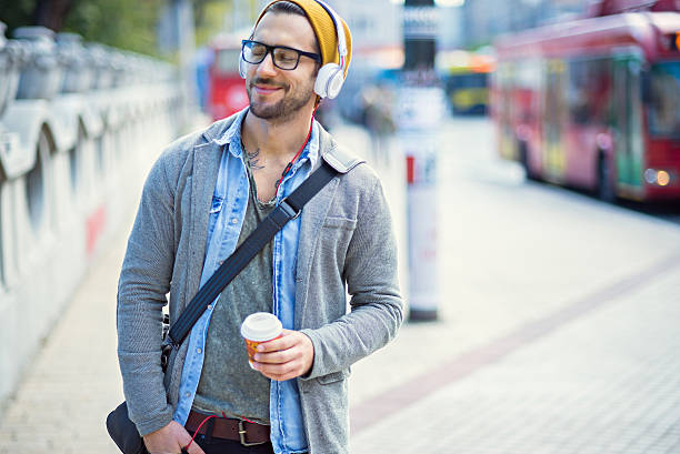 istock handsome man enjoying the music 525950667