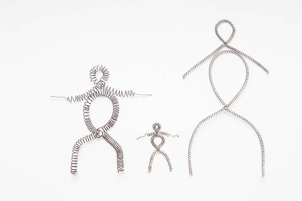 istock figures of men of wire 525953435