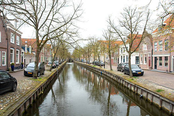 istock Edam, Netherlands,  canal and buildings in spring 525956944