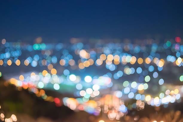 City at night with bokeh, Defocused abstract city night lights background viewpoint on the mountain