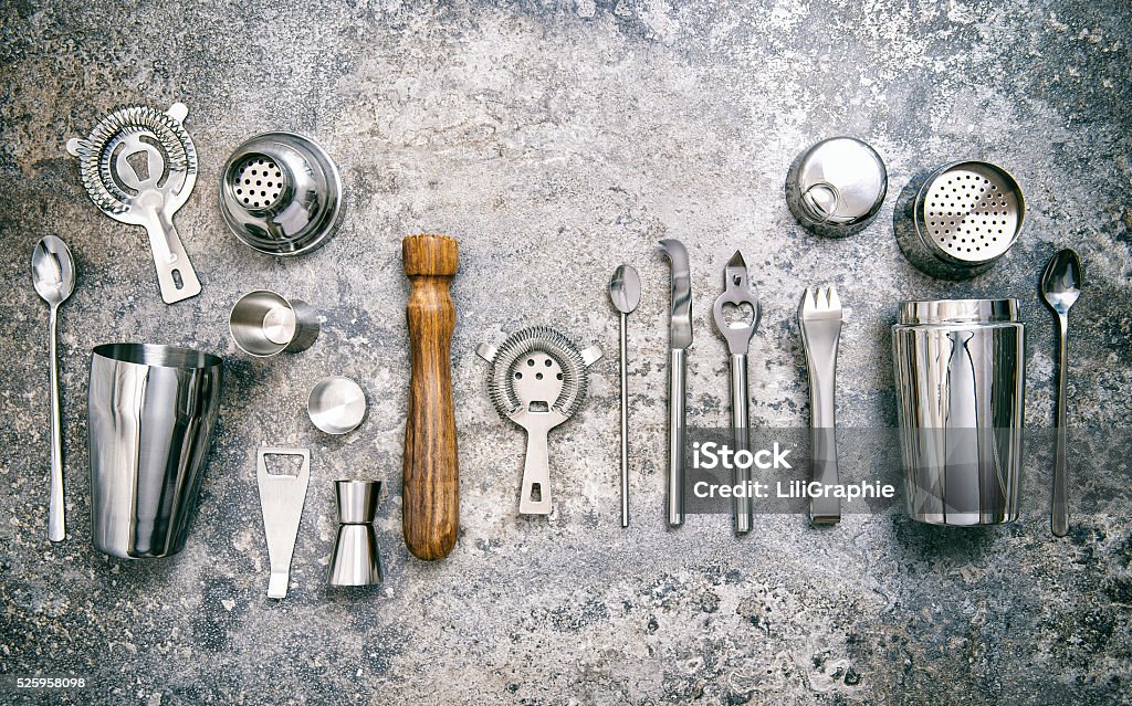 Bar tools making cocktail Shaker jigger Food beverages vintage Bar tools for making cocktail. Shaker, jigger, strainer, spoon. Food and beverages. Vintage style toned picture Bar Counter Stock Photo