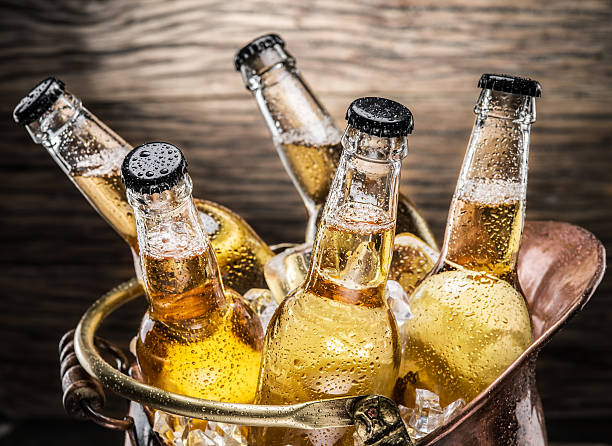 istock Cold bottles of beer in the brazen bucket. 525958644