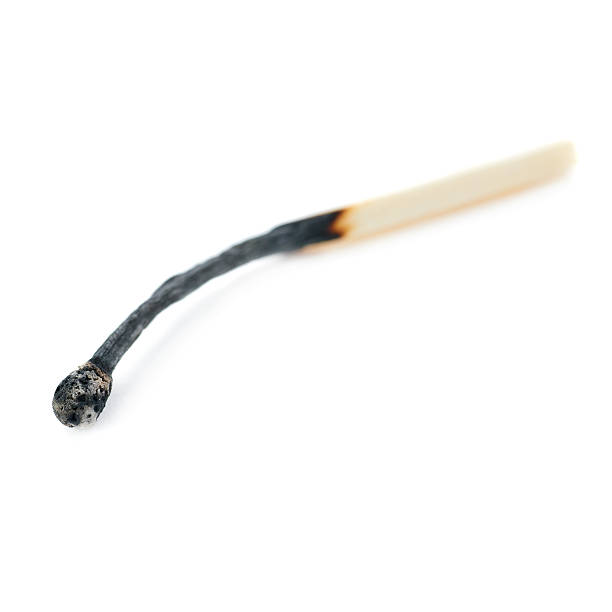 istock Wooden match isolated over the white background 525963160