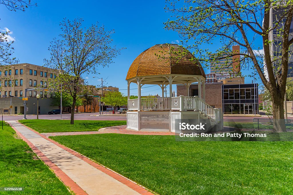 Town square with Gazebo downtown Lubbock, TX (P) Spring begins in the downtown Lubbock with a white gazebo and walkway ,Texas Lubbock Stock Photo