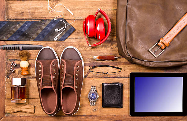 istock Men's accessories organized on table.  No people.  Knolling. 525965574
