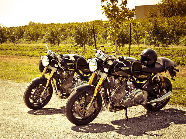 Pair of parked Norton 961 SE's St. Catharines, Ontario, Canada - August 30, 2014: A pair of brand new Norton Commando 961 SE motorcycles parked in St. Catharines, Ontario Canada norton brand name stock pictures, royalty-free photos & images