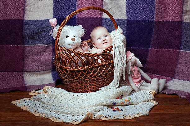istock Smiling baby in a basket 525967538