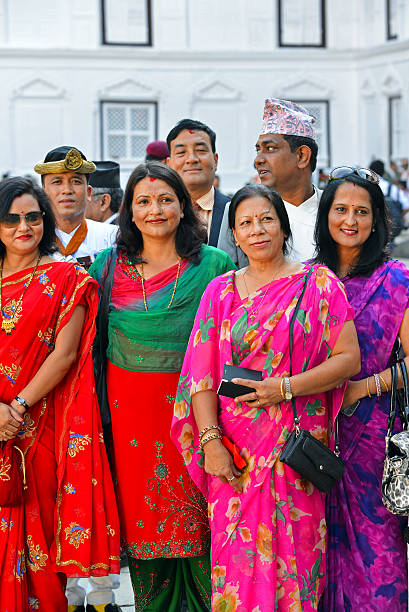 The Royal Ladies of Nepal Kathmandu, Nepal - October 11, 2013: People of the Nepalese high society, the Royal ladies, gathered in the Royal Palace to celebrate the first day of the Dashain festiva escort numarasi stock pictures, royalty-free photos & images