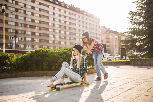 istock Young women enjoying skating outdoors 525968018