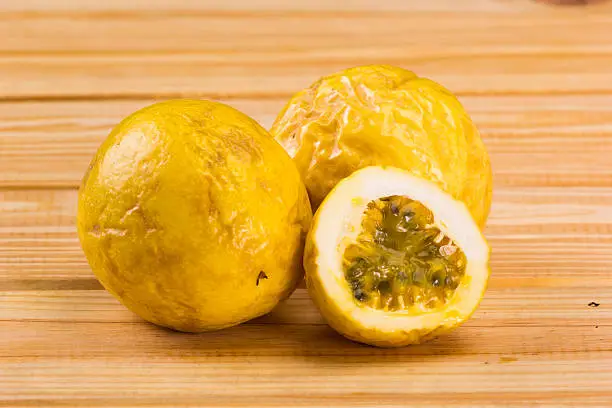 Maracuja, passion-fruit  on wooden table