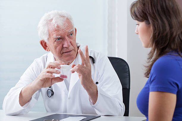 istock Doctor prescribing patient red pills 525968351