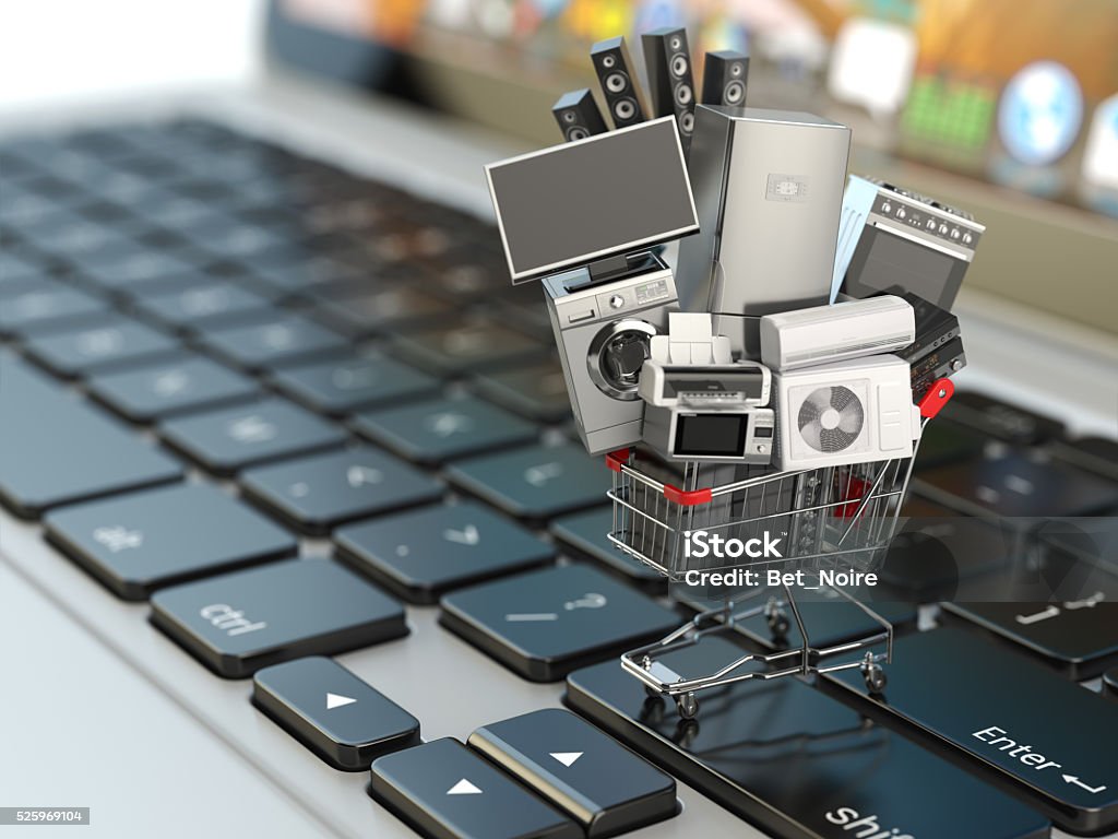 E-commerce or online shopping concept. Home appliance in shoppin E-commerce or online shopping concept. Home appliance in shopping cart on the laptop keyboard. 3d illustration Electronics Industry Stock Photo