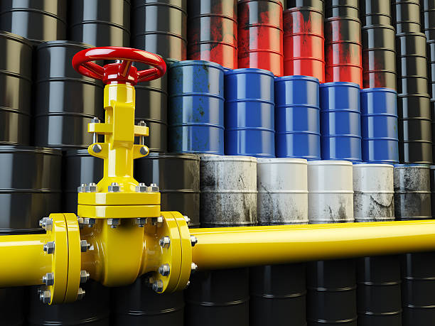 Oil pipe line valve in front of the russian flag stock photo