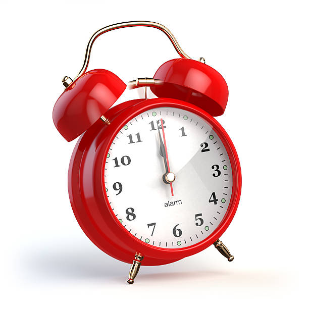 istock Ringing alarm clock isolated on white. Wake up concept. 525969462
