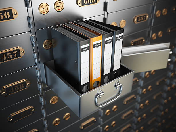 istock Ring binders on a safe deposit box. Confidential information con 525969798