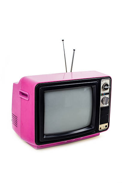 istock Pink vintage style old television isolated on white 525970099