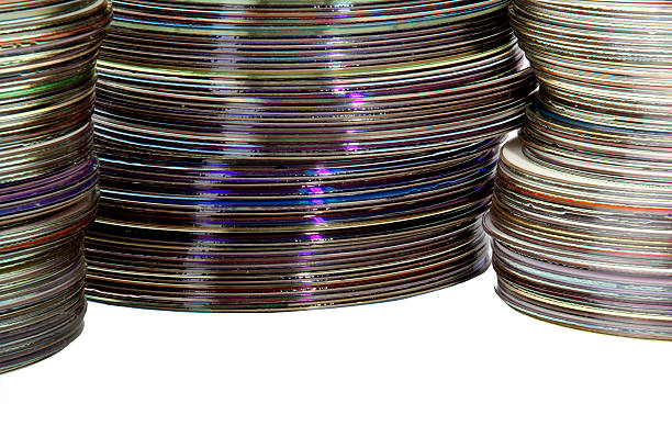 istock Closeup Three Piles of Colorful Compact Discs 525970351