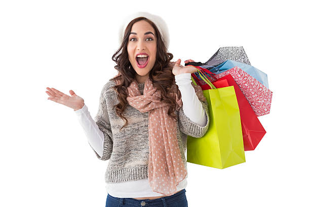 istock Excited brunette with shopping bags 525970623