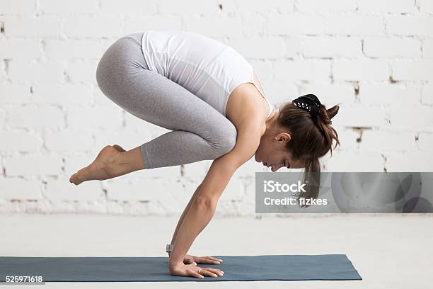 Yoga Indoors Bakasana Stock Photo - Download Image Now - Activity, Adult, Balance