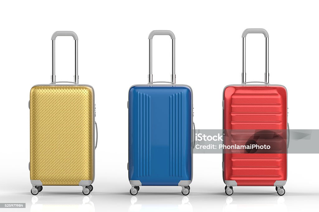 travel luggages gold, red and blue luggages on white background Suitcase Stock Photo