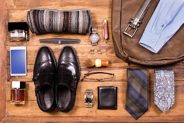 istock Men's accessories organized on table.  No people.  Knolling. 525972746
