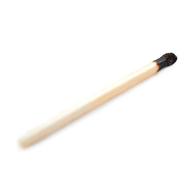 istock Wooden match isolated over the white background 525973200