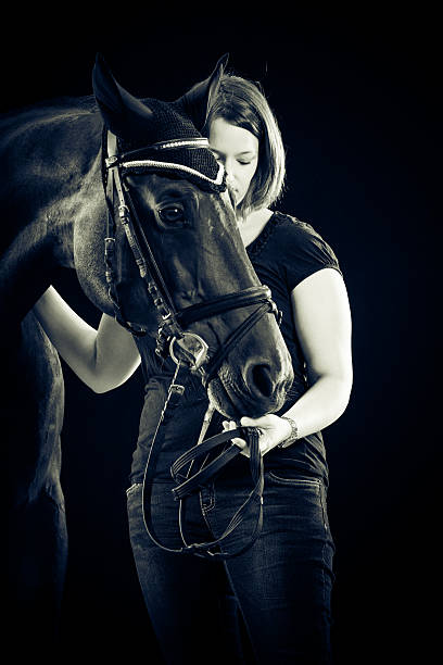 istock Woman With Her Horse 525973352