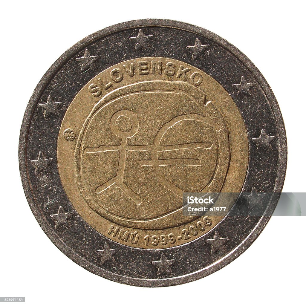 2 Euro coin from Slovakia (Slovensko) Commemorative 2 Euro coin (Slovakia 2009 - 10th anniversary of Euro currency circulating) isolated over white background Anniversary Stock Photo